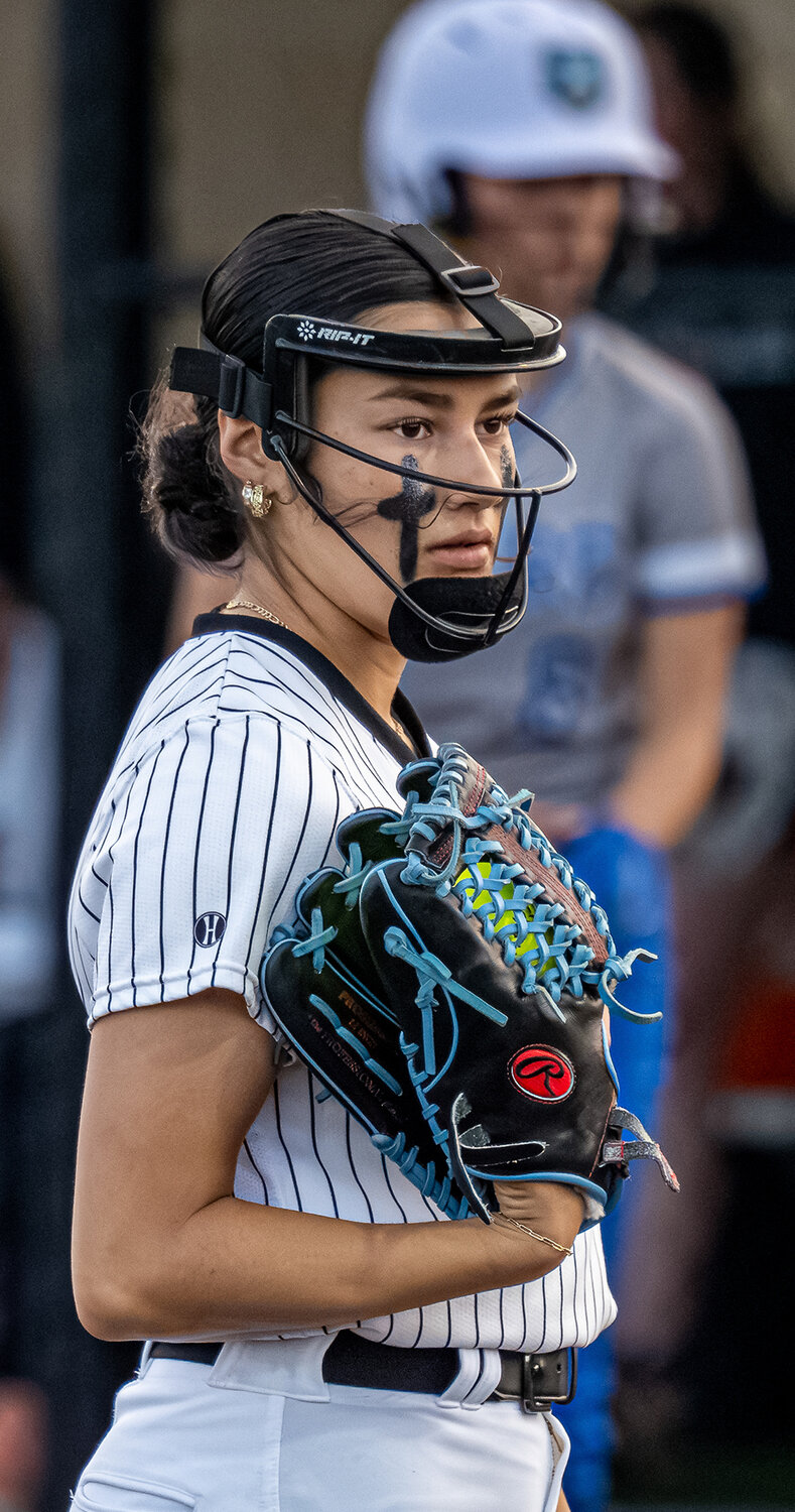 Brenlee Gonzales watches a Brewer hitter move from the on deck circle to the batters box during a recent home game. Gonzales threw six innings to pick up the win for the Ladycats in the Area rounds against Birdville on Thursday, May 2.
