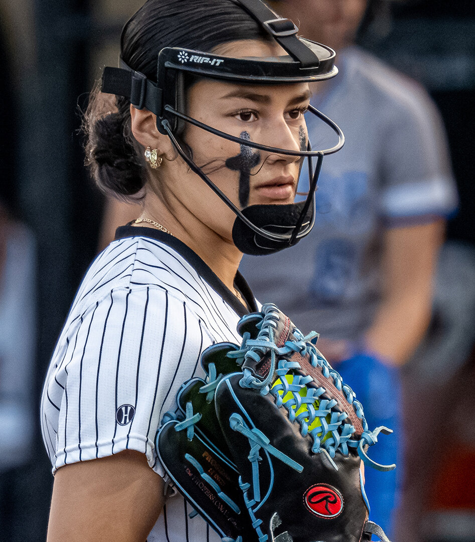 Brenlee Gonzales watches a Brewer hitter move from the on deck circle to the batters box during a recent home game. Gonzales threw six innings to pick up the win for the Ladycats in the Area rounds against Birdville on Thursday, May 2.