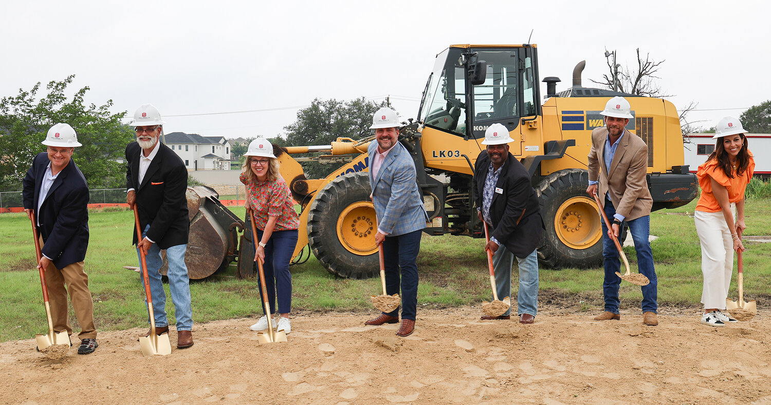 The City of Aledo recently held a groundbreaking for its new city hall. Shown are (from left) City Manager Noah Simon, city council members Shane Davis and Shawna Ford, Mayor Nick Stanley, and city council members Nelson Rowls, Christian Pearson, and Summer Jones. Once complete, the new city hall will house what is now the East Parker County Library.