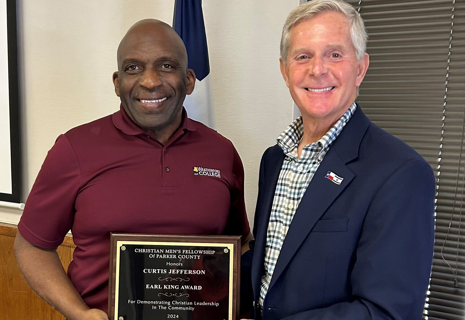 Doug Jefferson, son of Rev. Curtis Jefferson, accepts the Earl King Award for his father from Senator Phil King at a recent meeting of the Christian Men’s Fellowship of Parker County.