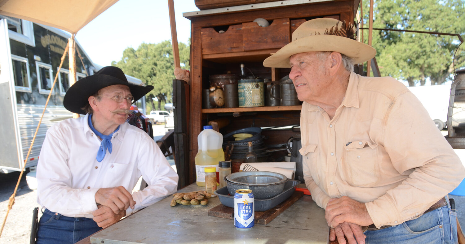 This is the 15th Parker County Ranch Rodeo for veteran chuck wagon cook-off competitors Gene Kotzure and Kenneth Kickendahl of Goliad. After visiting, the friends compete against each other from different wagons. Kotzure is the 2017 and 2018 first-place all-around chuck wagon cook.