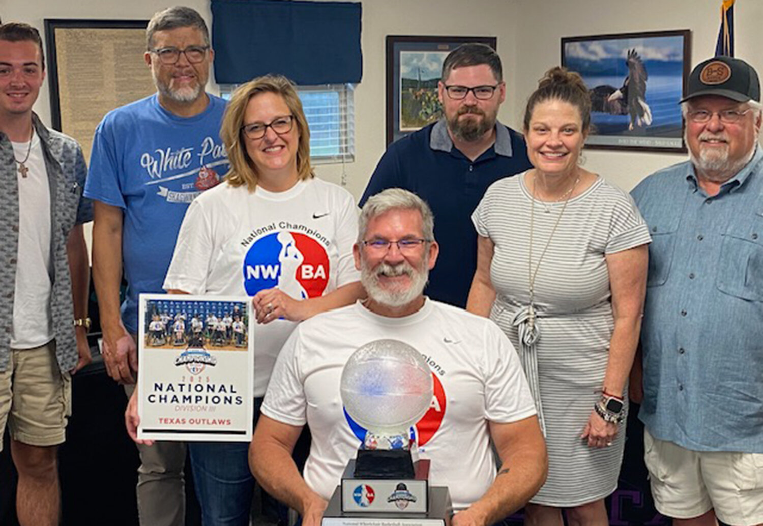 Shown are (from left) Eric Heaton, Shane Mudge, Amy Parks, Chris Parks, Brandon Thompson, Mayor Sandy Roberts, and Mayor Pro-tem Kent Stacey.
