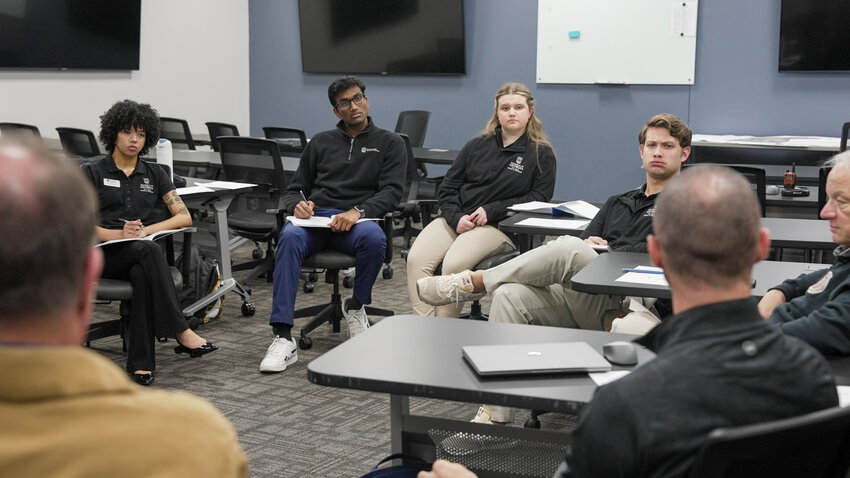 (Photo by Sara Ingram, UGA) A group of PROPEL Rural Scholars visited Emanuel County for an after-storm debrief. For their internship project, these scholars are to provide Emanuel County with tangible steps for improvement in disaster management and mitigation following Hurricane Helene. After a discussion with community stakeholders, the students toured storm impacted areas.