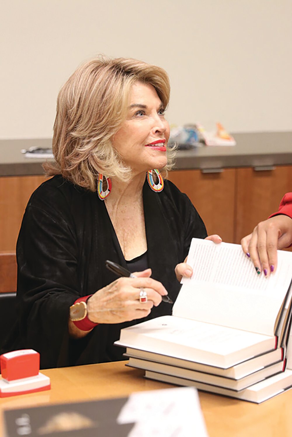 Pat Mitchell, a UGA alumna and past president of PBS and CNN productions, spoke at the UGA Special Collections Libraries on Nov. 4, 2019. She was introduced by her former classmate Tom Johnson (ABJ ’63), who then talked with her about her new book, “A Dangerous Woman.”..Photo: Sarah E. Freeman.