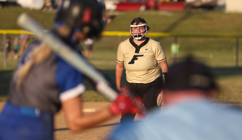 Fayette ace Skylar Sunderland pitches to her New Franklin counterpart, Bulldogs' starting pitcher Brynn Belstle.