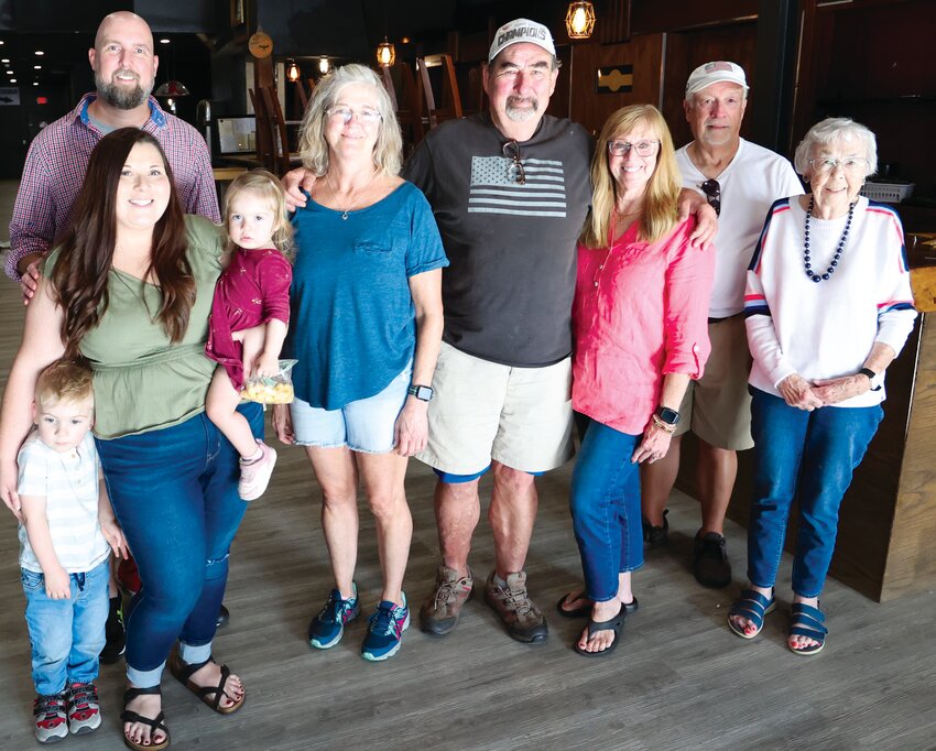 Family members returned to town to celebrate the news that McMillan’s Cafe will soon make a return to South Main Street in Fayette. Left to right: Julia McMillan-Rose with husband Thomas Rose and their children Thomas Rose and Nola Rose, proprietors Peggy O’Connell and Brian McMillan, Jan McMillan Hackman, Warren Hackman, and Joan McMillan.