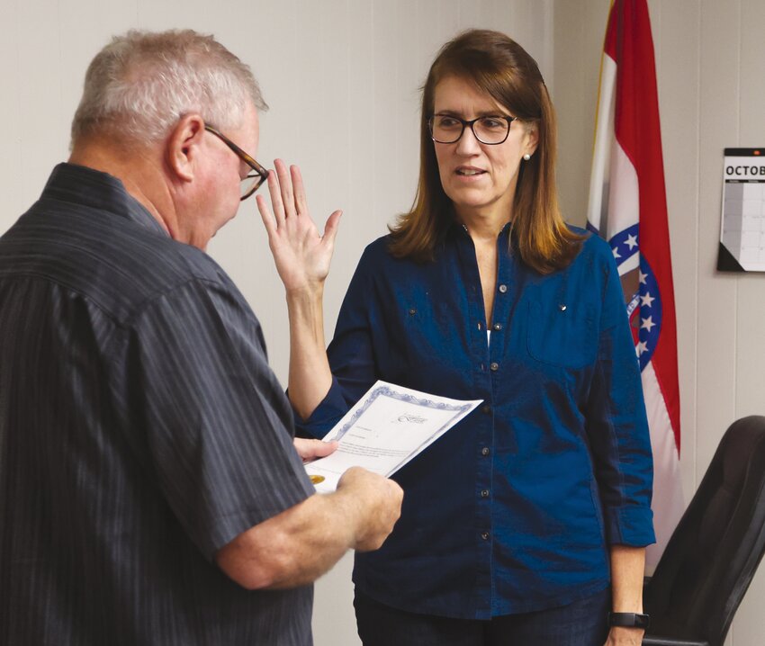 Fayette Mayor Greg Stidham swears-in new City Clerk Mati Rogers at a ceremony Thursday at City Hall.