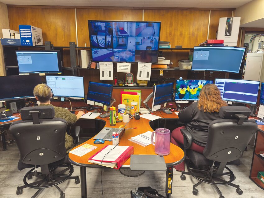 The 911 call center, located inside the Keller Building, is staffed by a minimum of two people, 24 hours a day, 365 days a year.