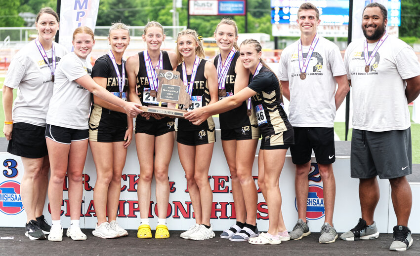 THE FAYETTE HIGH SCHOOL GIRLS had record-setting weekend at the Class 2 State Track & Field meet in Jefferson over the weekend. The Lady Falcons tied for third place overall to claim their first-ever state trophy. Freshman phenom Rylan Roberts won four medals and set a new state record in the triple jump. Left to right: Head coach Stacy Menees, Kennady Vroman, Chloe Bier, Payton Kindle, Hayden Sage, Rylan Roberts, Paige Vroman, and assistant coaches Hayden Weatherman and Spencer Gerald.
