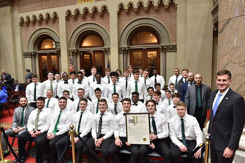 Assemblyman Colin Schmitt with the Cornwall football team that won the state championship.