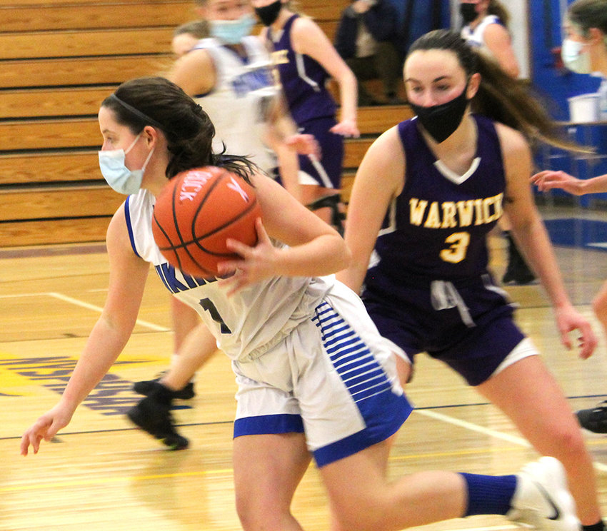 Valley Central&rsquo;s Emma Rechtorovic dribbles away from Warwick&rsquo;s Kristen Desrats during Thursday&rsquo;s girls&rsquo; basketball game at Valley Central High School in Montgomery.