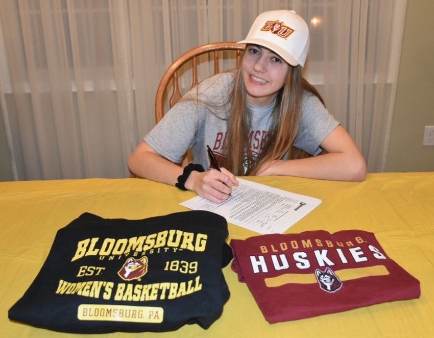 Valley Central senior Nickole Schmidt signs her National Letter of Intent to play women&rsquo;s basketball at Division II Bloomsburg University.