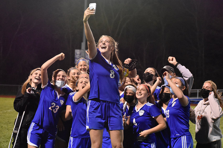 Maddie Feller grabs a selfie after her Valley Central Vikings captured the Section 9 girls soccer championship for the first time in school history.