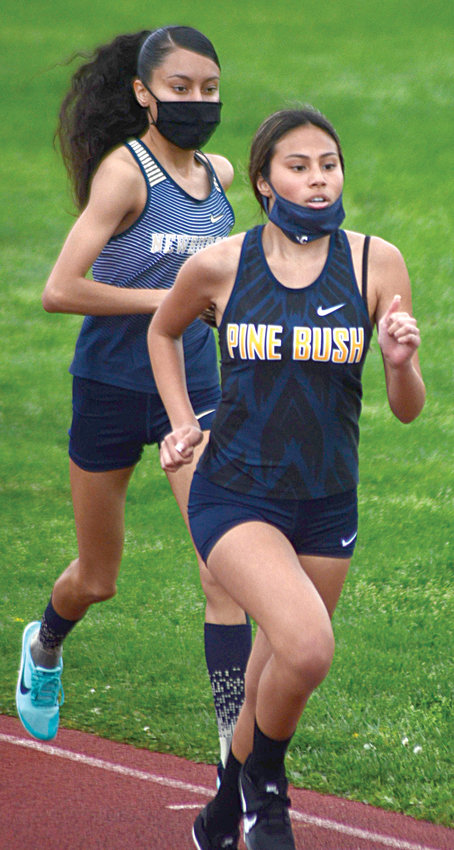 Pine Bush&rsquo;s Hannah Pawlowski wins the 1,500-meter run ahead of Newburgh&rsquo;s Melina Sanchez.