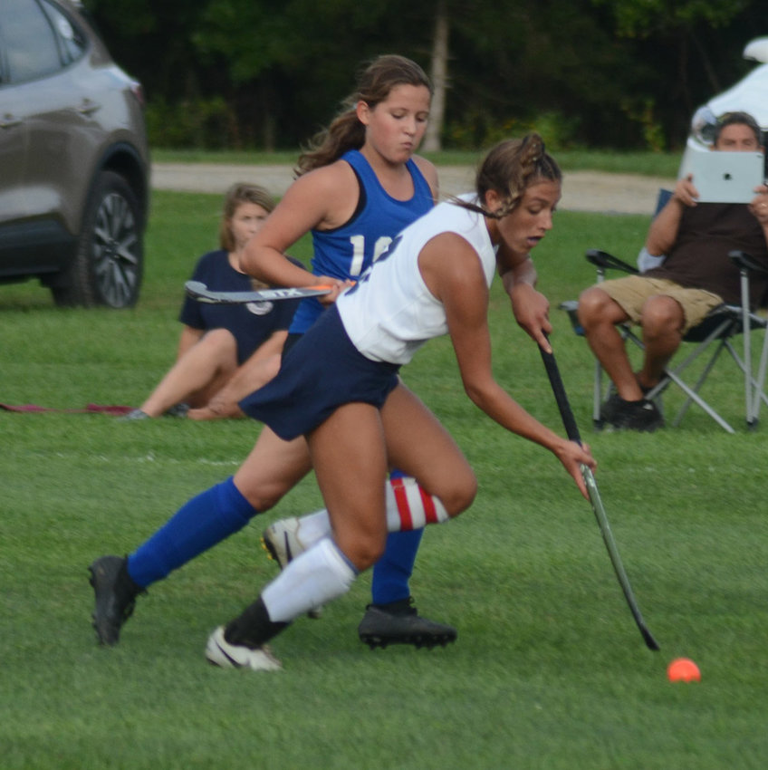 Pine Bush&rsquo;s Jennifer Sorrentino brings the ball down the field as Coxsackie-Athens&rsquo; Addison Chimento pursues during Wednesday&rsquo;s non-league field hockey game at Pine Bush Elementary School.