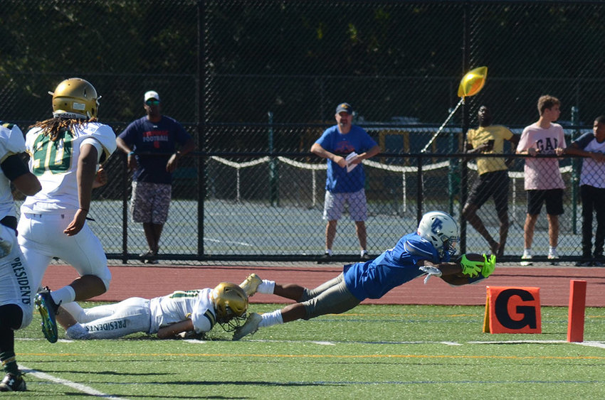 Valley Central&rsquo;s Elijah Bellinger dives toward the goal-line as FDR&rsquo;s Aidyn VanSteenburg tries to make the tackle during Saturday&rsquo;s Class A football game at FDR High School in Hyde Park.
