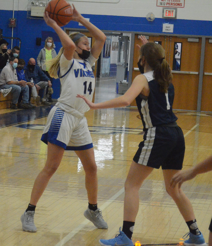 Valley Central&rsquo;s Mackenzie Delmonico looks to pass as Burke Catholic&rsquo;s Michaela Byrons defends during Friday&rsquo;s Corinne Feller Memorial Tournament girls&rsquo; basketball game at Valley Central High School in Montgomery.