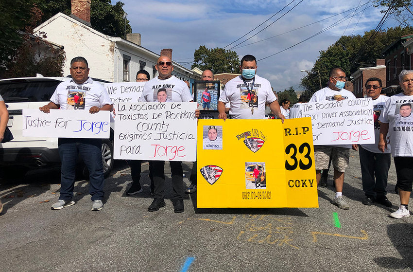 Supporters of slain cab driver Arbayza De La Cruz  took to the streets in early October after he was murdered in an attempted robbery on North Miller Street.