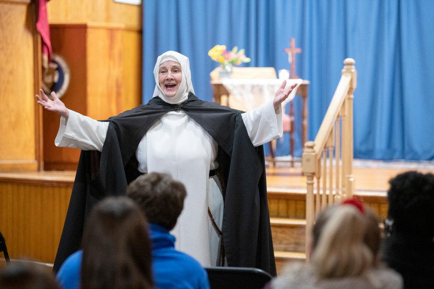 Sister Nancy Murray, O.P. portrays Saint Catherine of Sienna during a performance in Whittaker Hall on March 23, 2022, giving insight of the famous Dominican saint, scholar and mystic.