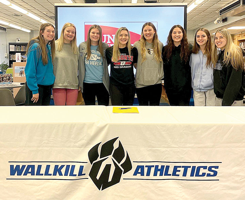 Emma Schwarzbeck, fourth from left, is shown with Wallkill basketball teammates, from left, Alex Deminsky, Jordyn Detz, Sam Dembinsky, Amy Crowley, Alexis Mesuch, Zoe Mesuch and Grace Mesuch.