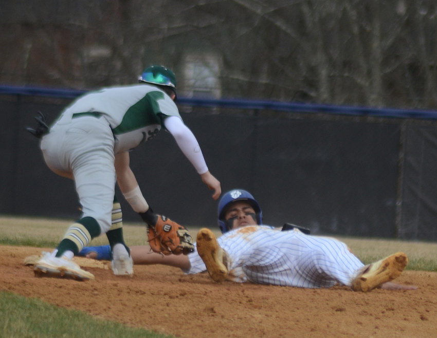 Wallkill&rsquo;s James Lee steals second base as FDR shortstop Shane Baxter applies the tag during a Mid Hudson Athletic League Division I baseball game on April 4 at Wallkill Senior High School.