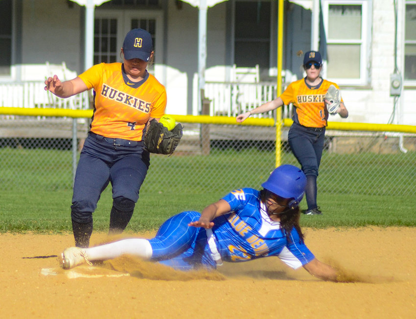 Ellenville&rsquo;s Adrianna Andrews slides safely into second base as Highland second baseman Sophia Canino tries to force her out  during Friday&rsquo;s MHAL softball game at Highland High School.