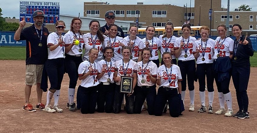 The Marlboro softball team poses with the Section 9 Class B championship plaque after defeating Highland, 4-1, in Friday&rsquo;s title game at Middletown High School.