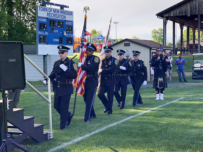 The New Windsor Police Department Color Guard present the colors.