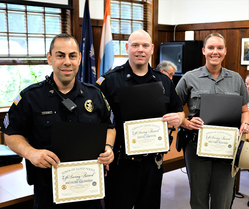 Three Law Enforcement Officers received Life saving Awards from Lloyd Police Chief James Janso: [L-R] Sgt. Anthony Kalimeras, Officer Dan Labodin and Trooper Brittany Schurko.