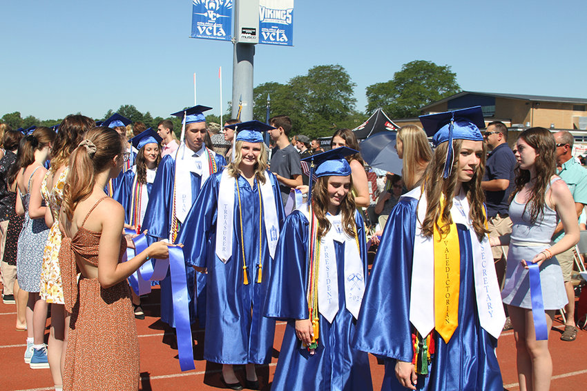 Valedictorian Rian Dickman led the procession of graduates onto the field. Underclass members of the National Honor Society served as honor escorts.