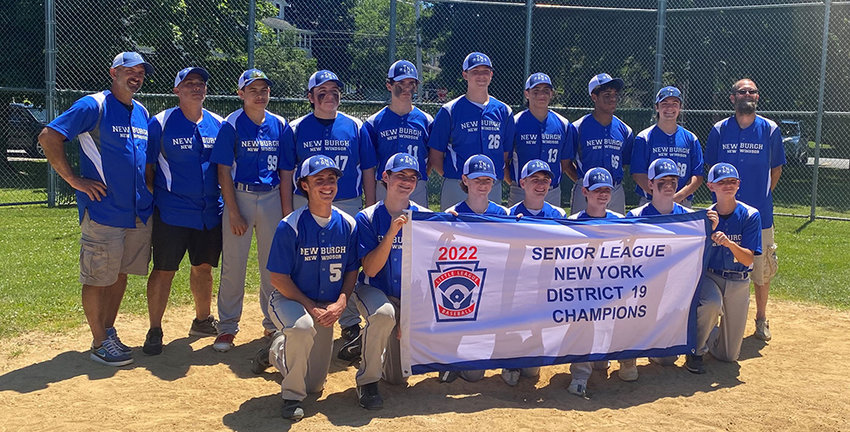 The Town of Newburgh-New Windsor Senior baseball team poses with the District 19 championship flag after beating Wallkill Area, 8-2, at Watts Memorial Park in Middletown.