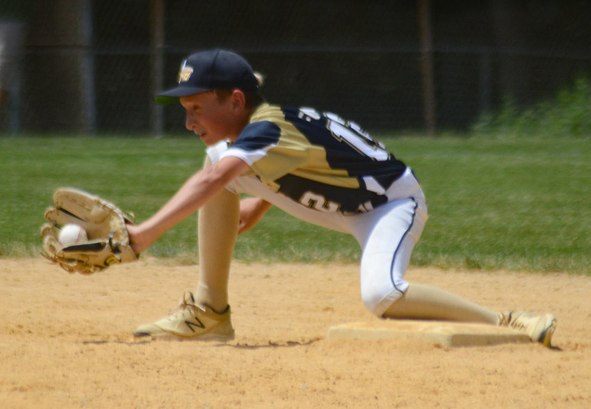 Pine Bush shortstop Troy Fontana takes a throw at second base during Saturday&rsquo;s District 19 Major baseball game at the Town of Wallkill Little League complex.