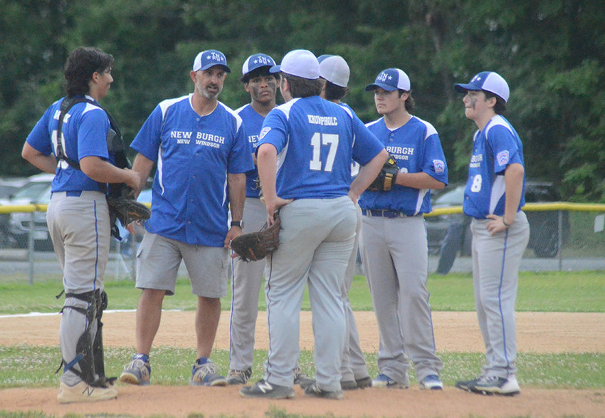 Town of Newburgh-New Windsor manager Craig Wood talks to his team during a Section 3 championship senior baseball game at the Town of Newburgh Little League Complex on July 5.