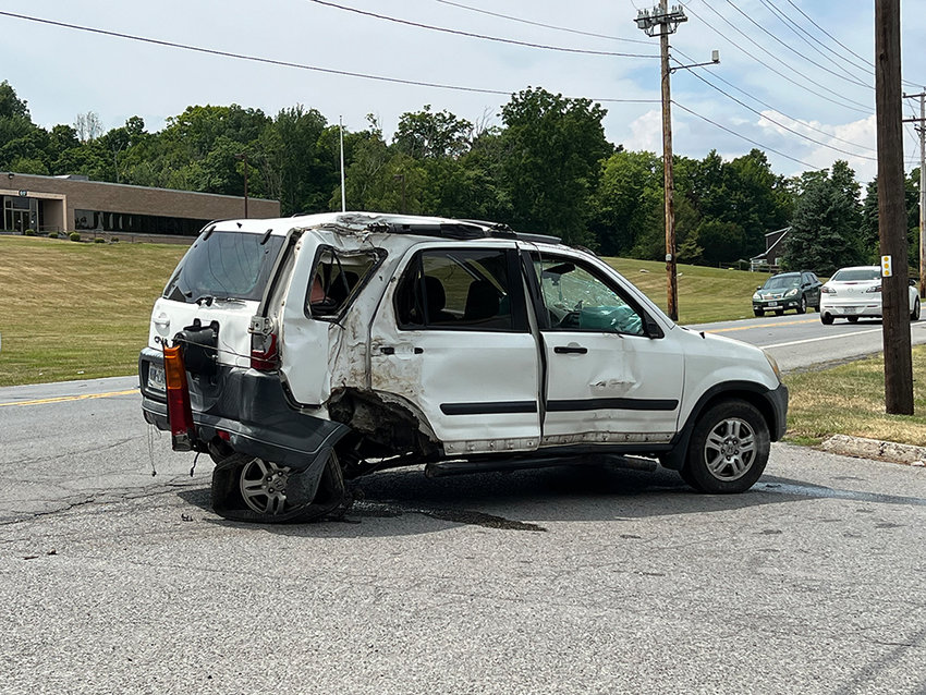 The remains of an abandoned and partially destroyed white CRV along Little Britain Road. The driver was reported to have fled the scene into the wooded areas by Central Hudson.