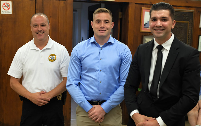 The Lloyd Town Board approved hiring Brady J. Robin [center] as a part time dispatcher and Richard Belliveau Jr. as a full time Police Officer at the recommendation of Chief James Janso.