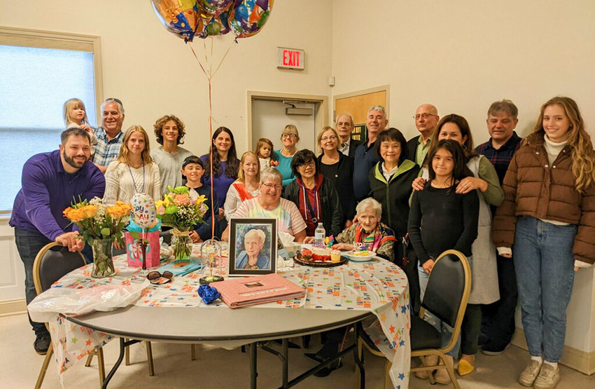Family members of Rita Freeman gather in the Maybrook Senior Center her 102nd birthday party.  An additional 23 joined in the festivities via Zoom.