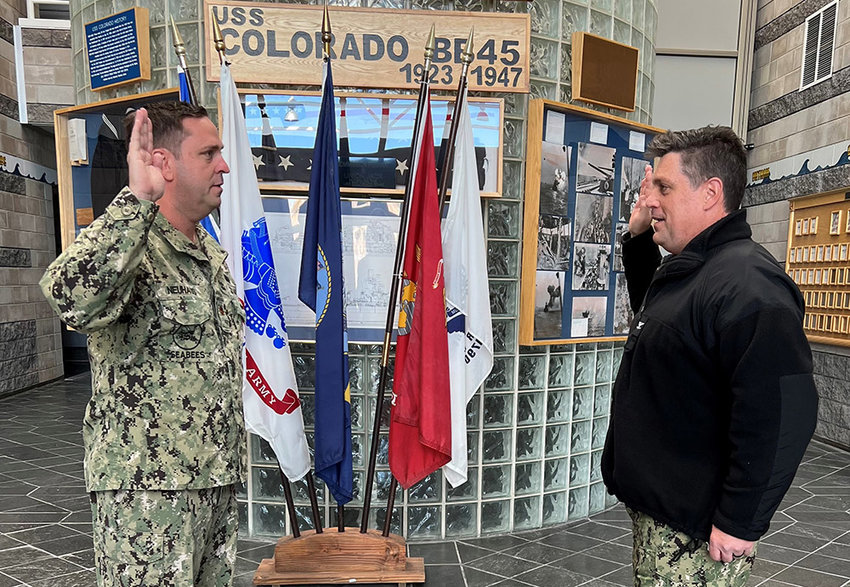 Orange County Executive Steven M. Neuhaus (left) and Navy Operational Support Center Commanding Officer Captain James MacDonald.
