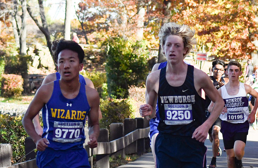 Newburgh&rsquo;s Devin Batelic trails Washingtonville&rsquo;s Jason Ariano during Wednesday&rsquo;s Section 9 Class A boys&rsquo; cross country championship race.