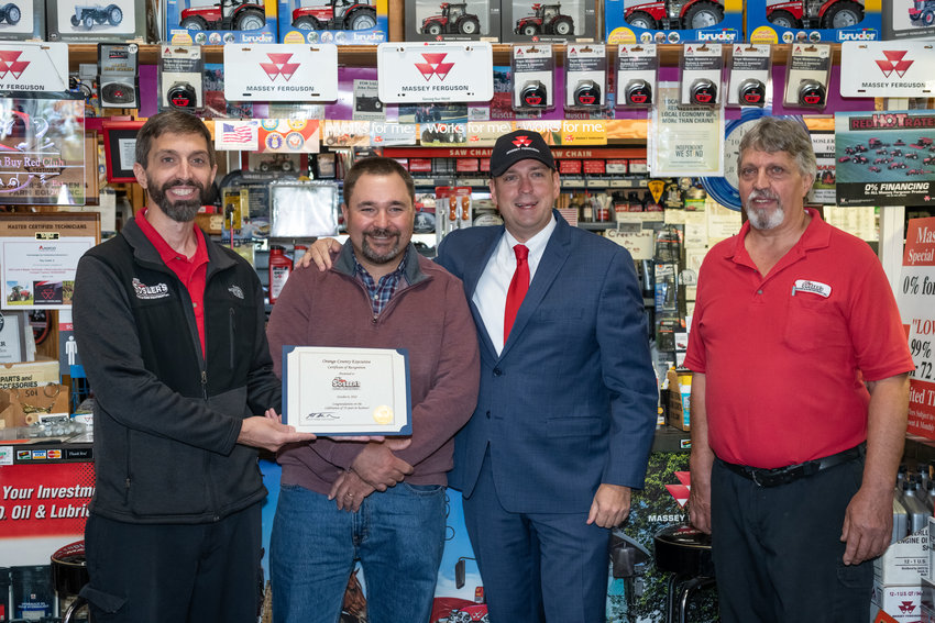 Orange County Executive Steve Neuhaus presented a certificate of recognition to Sosler&rsquo;s Garden and Farm Equipment for 70 years of service.
