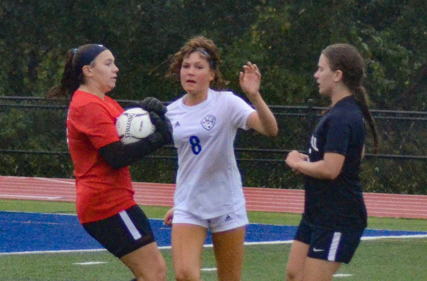 Wallkill goalkeeper Madelyn Jachimiak catches the ball as Valley Central&rsquo;s Samantha Setteducato closes in and Wallkill&rsquo;s Page Badner defends during a non-league girls&rsquo; soccer game on September 6 at Wallkill Senior High School.