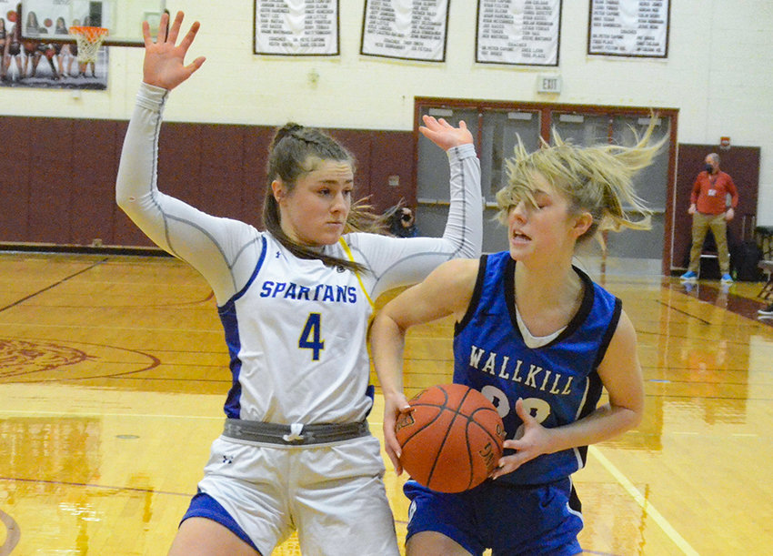 Wallkill&rsquo;s Emma Spindler drives to the basket as Maine-Endwell&rsquo;s Kaety L&rsquo;Amoreaux defends during a NYSPHSAA Class A subregional girls&rsquo; basketball game on March 10 at Johnson City High School.