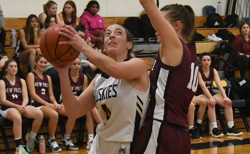 Highland&rsquo;s Danica Valente shoots over New Paltz&rsquo;s Lilly Sturgis during Friday&rsquo;s non-league girls&rsquo; basketball game at Highland High School.