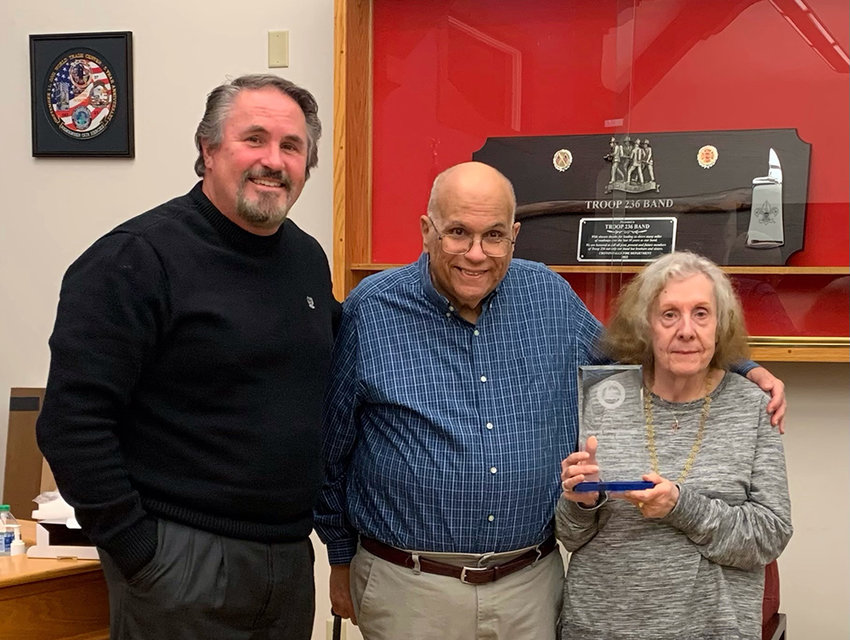 Maybrook Mayor Dennis Leahy (l.) presents the Joseph E. Dineen 2022 Award to long-time Church of the Assumption volunteers Deacon Edward Grosso and his wife Barbara.  The deacon served in the parish and, with his wife, taught in the program, with Mrs. Grosso also director of the program.