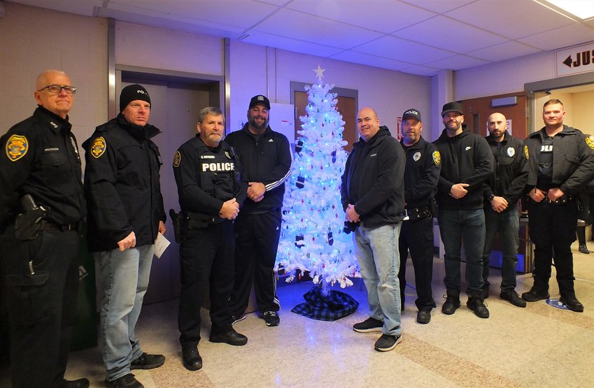 Many Marlborough officers attended the annual Blue Light Ceremony. Pictured (l. &ndash; r.) Police Officers Fulton, Masten, Hoffman, Sgt. Pascale,  Chief Cocozza, Officers Griffing, DiViesti, DesJardines and Hensley.