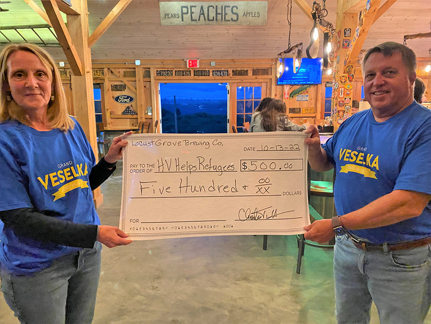 Peggy and Chip Kent, of Locust Grove Brewing Co, donated $500 to B. J. Mikkelsen&rsquo;s Hudson Valley Helps Refugees organization to help in his effort to aid war torn Ukraine.
