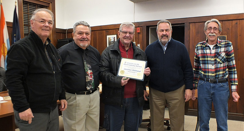 Larry Hammond was honored by the Lloyd Town Board for his 35 years of service on the town&rsquo;s Planning Board. Pictured L-R councilmen Mike Guerriero, John Fraino, Hammond, Supervisor Dave Plavchak and councilman Lenny Auchmoody.