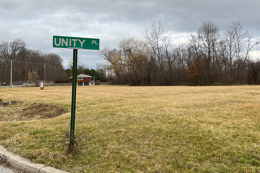 The current grass field and wooded area along Unity Place where the proposed warehouse is seeking to be constructed in the Town of Newburgh.Brooker Engineering&rsquo;s proposed site plan for a new 154,700 square foot warehouse along Unity Place.