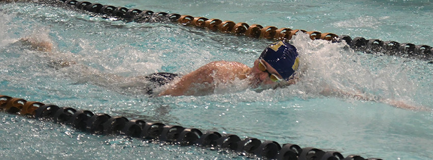 Newburgh&rsquo;s Peyton Tuttle swims the freestyle leg of the 200-yard individual medley relay during a January 3 boys&rsquo; swimming and diving meet at Newburgh Free Academy.