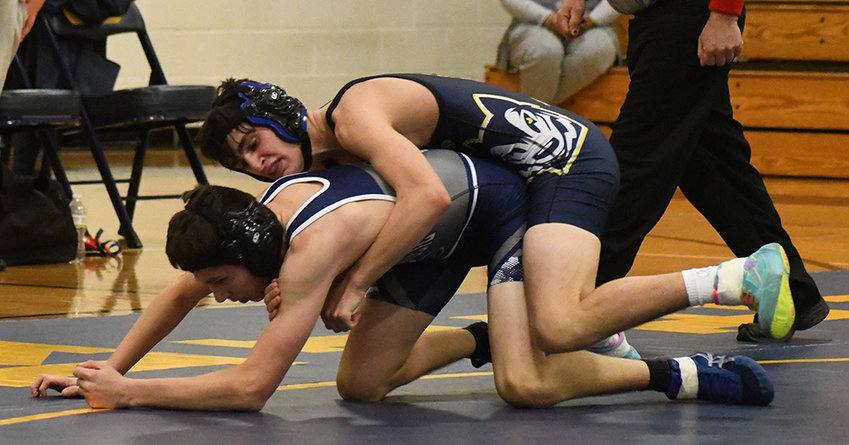 Highland&rsquo;s Bradley Gatto controls Burke Catholic&rsquo;s Erik Francisco during a 126-pound bout at Wednesday&rsquo;s wrestling dual meet at Highland High School.