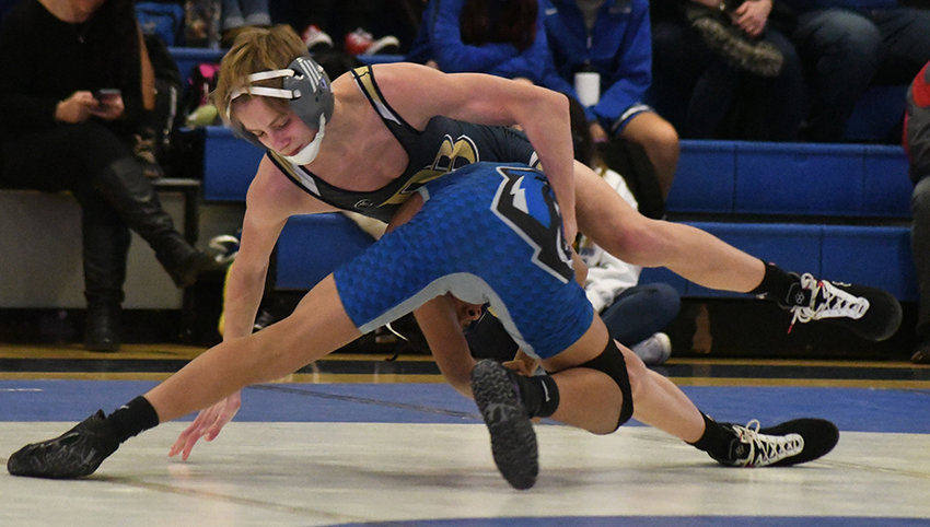 Pine Bush&rsquo;s Gabriel McNally controls Middletown&rsquo;s Andrew Smith during a 102-pound bout at Wednesday&rsquo;s wrestling dual meet at Middletown High School.